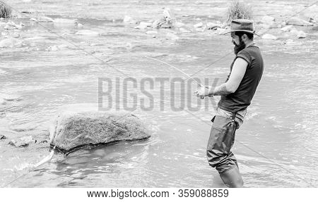 Fishing Tours. Hobby And Sport Activity. Pothunter. Fisherman With Fishing Rod. Summer Weekend. Big 