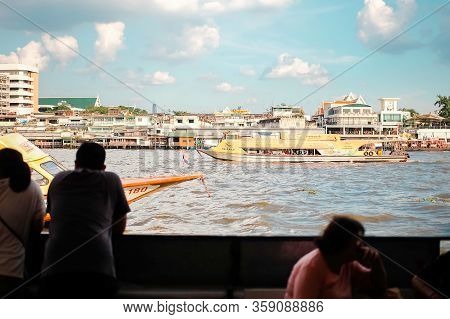 Bangkok, Thailand - December 01 2019: Many People Sailing Boat Or Ship In Chaophraya River From Wang