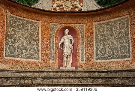 Salzburg, Austria - May 28, 2019: One Of The Many Baroque Or Classical Statues At The Hellbrunn Esta
