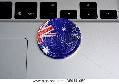 Bitcoin Close-up On Keyboard Background, The Flag Of Australia Is Shown On Bitcoin.