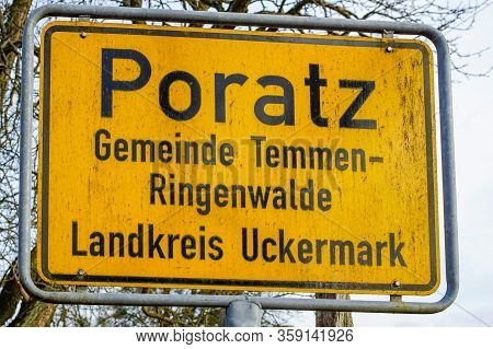 Poratz, Brandenburg, Germany - March 11, 2018: Yellow Town Sign Of The Brandenburg Hamlet Poratz