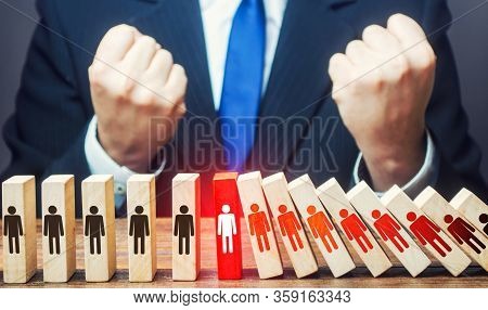 Man Is Glad That Fall Of Dominoes With People Has Stopped. Stopping Spread Of A Pandemic Corona Viru