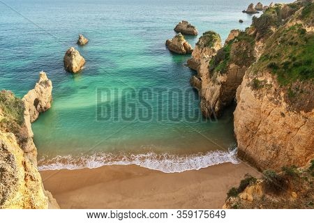 A Beautiful Bay Landscape On The Portuguese Beach Of Boiao, A Clear Blue Turquoise Sea. Algarve
