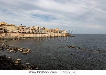 Cityscape Of The Siracusa City In Sicily, Italy With A Fortification On The Lungomare Ortigia Street