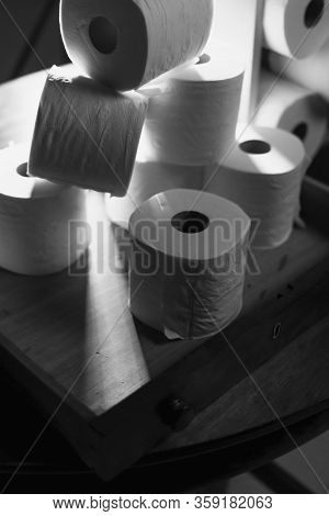 Dramatic Close Up Of Toilet Paper Supply