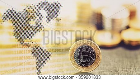 Currency Of A Brazilian Real, With Blurred Image In The Background Of Several Currencies. Award, Sav