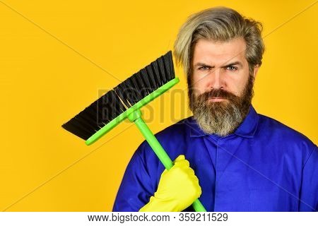 Cleaning Agency. Worker With Brush. Cleaning Equipment. Yardman Occupation. Bearded Hipster Blue Uni