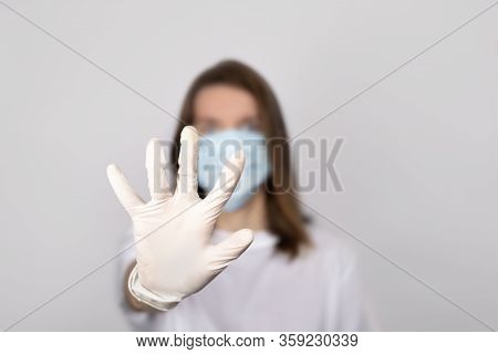 Stop Coronavirus And Air Pollution Concept. Young Women Wearing Pp Non-woven Disposable Medical Face