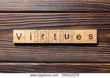 Virtues Word Written On Wood Block. Virtues Text On Wooden Table For Your Desing, Concept