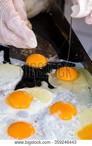 Eggs For Cooking, Top View, Natural Quick Breakfast Of Fresh Eggs. Female Hands Break Eggs For A Qui