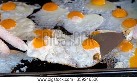 Eggs For Cooking, Top View, Natural Quick Breakfast Of Fresh Eggs. Female Hands Break Eggs For A Qui