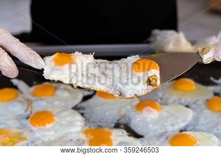 Eggs For Cooking, Top View, Natural Quick Breakfast Of Fresh Eggs. Female Hands Break Eggs For A Qui