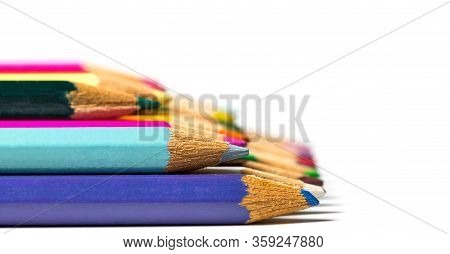 Colored Wooden Sharpened Pencils For Office And School On A White Background