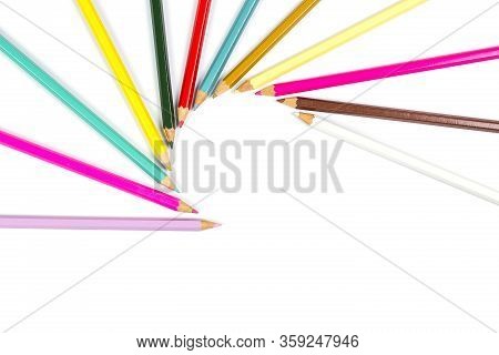 Colored Wooden Sharpened Pencils For Office And School On A White Background