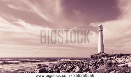 Slangkop Lighthouse Near The Town Of Kommetjie In Cape Town, Sou