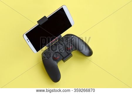 Gamesir G3s Modern Black Gamepad For Smartphone On Yellow Background Close Up
