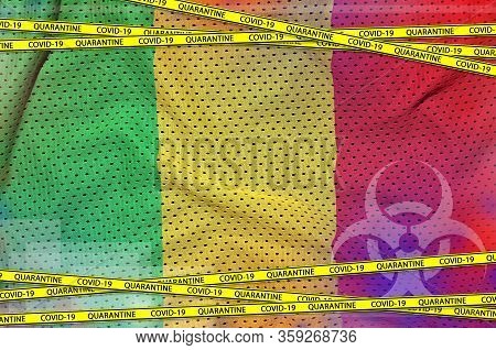 Mali Flag And Covid-19 Quarantine Yellow Tape. Coronavirus Or 2019-ncov Virus Concept