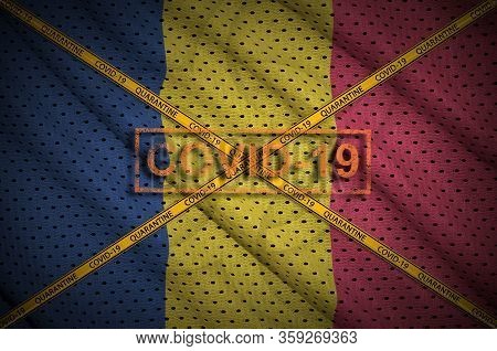 Chad Flag And Covid-19 Stamp With Orange Quarantine Border Tape Cross. Coronavirus Or 2019-ncov Viru