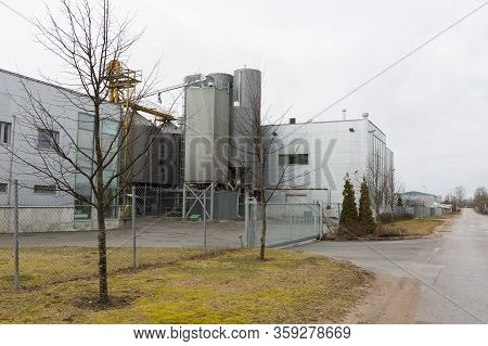 Beer Factory And Street With Metal Constructions.