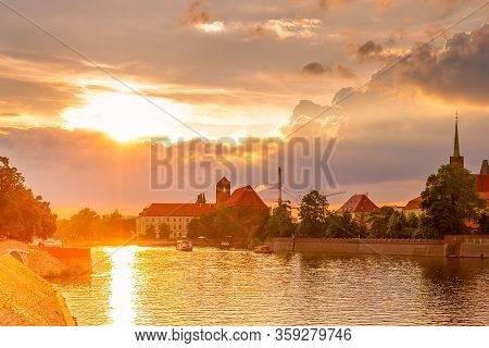 Wroclaw, Poland Sunset Panoramic View With Ostrow Tumski Island, Odra Or Oder River And Cathedral To
