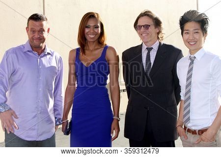 LOS ANGELES - MAY 19:  Lenny Venito, Toks Olagundpye, Simon Templeten, Tim Jo at the Disney Media Networks International Upfronts at the Walt Disney Studios on May 19, 2012 in Burbank, CA