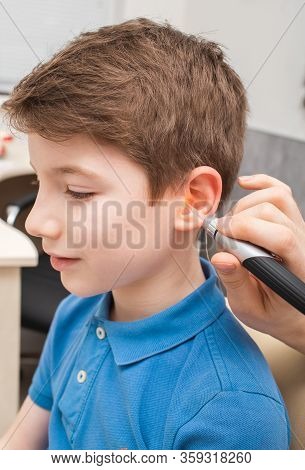 Process Of Making A Custom Earplug For A Child. Stages Of Manufacturing Earplugs. Audiologist Makes 