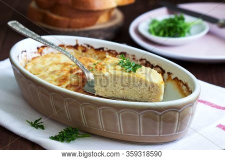 Dietary Souffle Of Minced Meat With Parsley On A Dark Background.