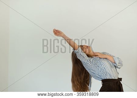 Young Beautiful Girl Is Dancing In The Style Of Contemp.
