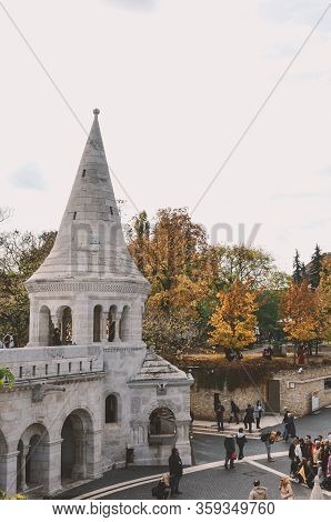 Budapest, Hungary - Nov 6, 2019: Tourists Sightseeing And Taking Photos Of Fishermans Bastion In The