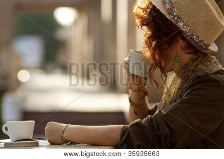 Stylish Lady Drinking Coffee Outdoors