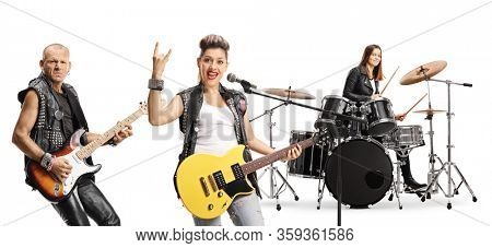 Two female and one male musician in rock band performing isolated on white background