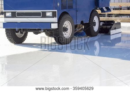 Special Machine Ice Harvester Cleans The Ice Rink. Transport Industry