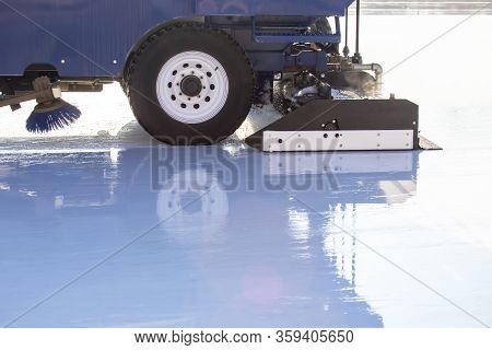 Special Machine Ice Harvester Cleans The Ice Rink. Transport Industry