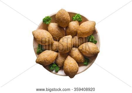 Isolated Arabic Meat Appetizer Kibbeh. Traditional Arabic Kibbeh With Lamb And Pine Nuts.