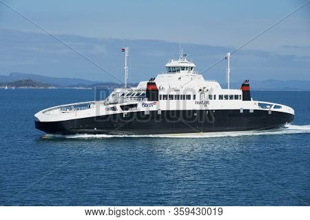 Tveit, Norway - June 06, 2010: Ferry Boat Arriving To The Port In Tveit, Norway.