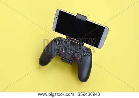 Gamesir G3s Modern Black Gamepad For Smartphone On Yellow Background Close Up