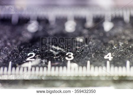 Macro View Of Old And Worn Measuring Instrument Units In Inches Centimeter Milimeter
