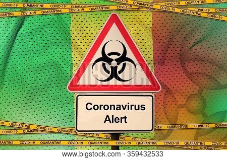 Mali Flag And Covid-19 Biohazard Symbol With Quarantine Orange Tape. Coronavirus Or 2019-ncov Virus 