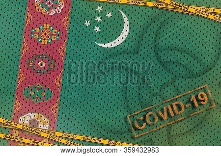 Turkmenistan Flag And Covid-19 Biohazard Symbol With Quarantine Orange Tape And Stamp. Coronavirus O