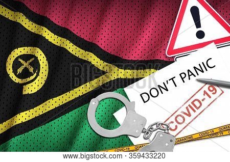 Vanuatu Flag And Police Handcuffs With Inscription Dont Panic On White Paper. Coronavirus Or 2019-nc