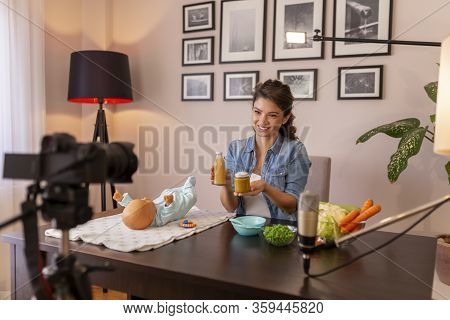 Female Vlogger Filming Video About Introducing Soft Food To Baby Nutrition And Preparation Of Fresh 