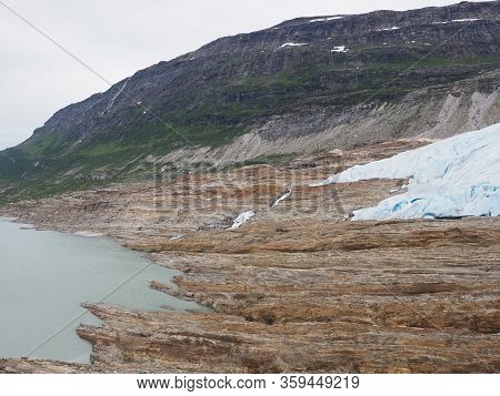 Austerdalsvatnet Lake Landscapes And Famous European Svartisen Glacier Tongue In Nordland County In 