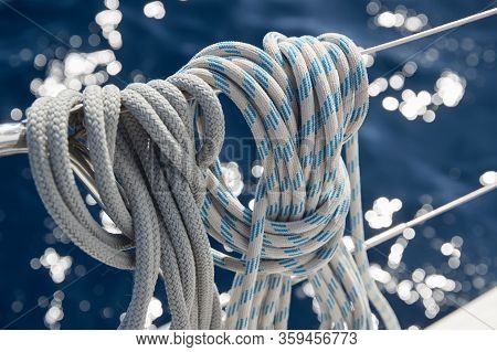 Close-up View Of Sailboat Ropes At Sunny Weather, Pulleys And Ropes On The Mast, Yachting Sport, Shi