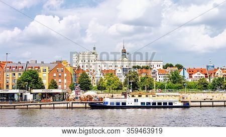 Stettin Poland June 2018 Ship On Odra River, Piastowski Boulevard, People Relaxing In Cafeteria. Cas