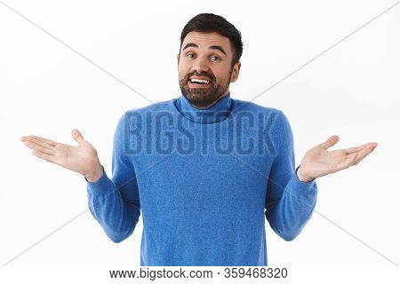 Well There Is Nothing We Can Do. Portrait Of Careless Calm And Relaxed Handsome Bearded Man Cant Say