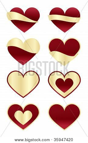 Conjunto de corações vermelhos com rótulos de ouro