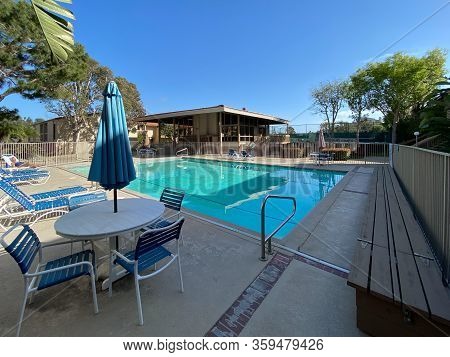 Community Swimming Pool And Jacuzzi Inside Typical Private Condo Complex. In Solana Beach, San Diego