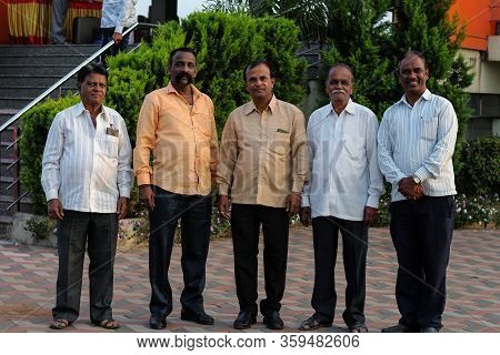 Kolhapur, Maharashtra/ India- December 12th 2019; Group Of Indian People Smiling And Posing For A Ph