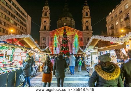 People Enjoying The Colorful Budapest Christmas Maekets, Hungary
