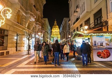 People Enjoying The Colorful Budapest Christmas Maekets, Hungary